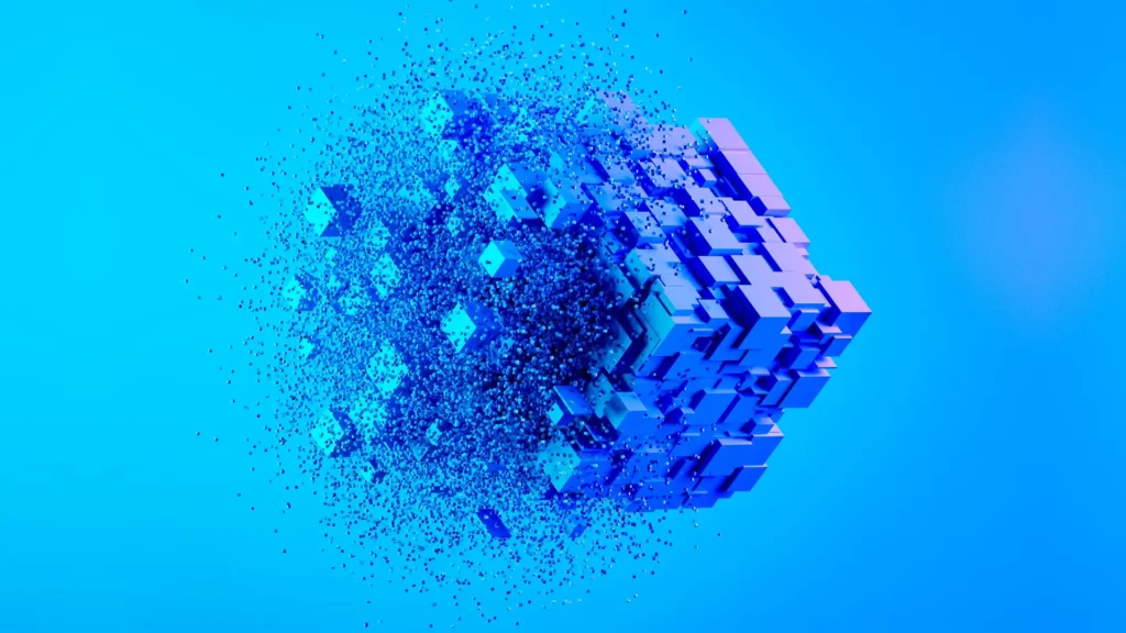 Image of an abstract cube with a particle burst